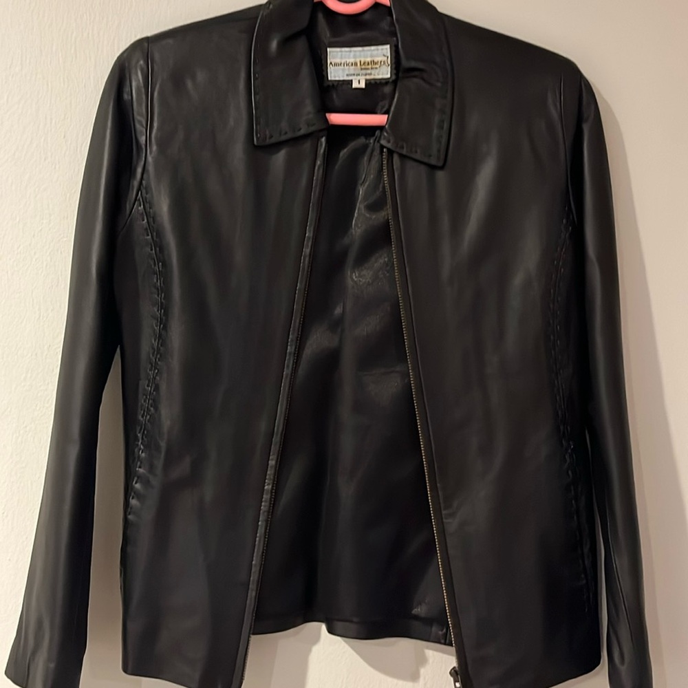 Elegant Black Leather Jacket by [Brand]